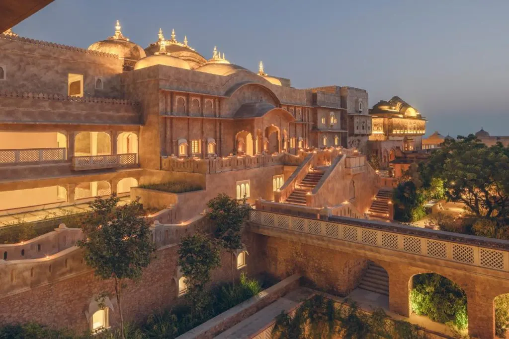 Six Senses luxury resort in India, surrounded by lush greenery and serene landscapes.