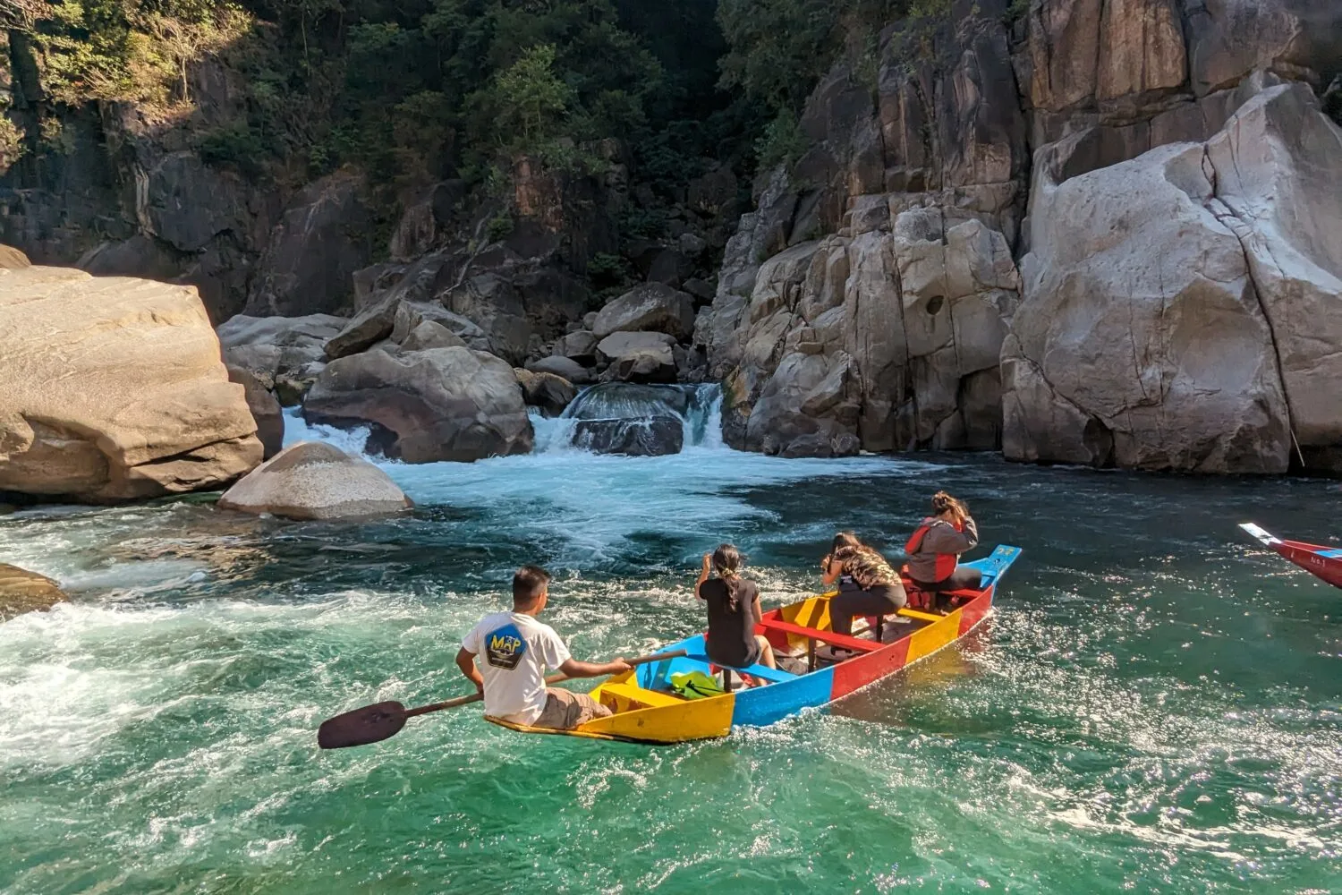 Boating in Umngot River in Amkoi